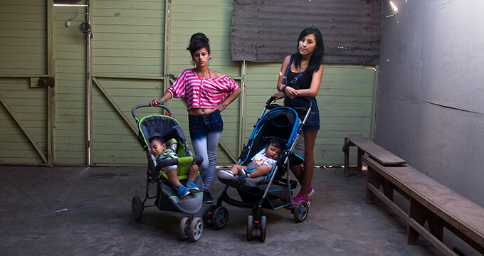 Two teenage mothers with their children. They now advocate for family planning access in their communities. 