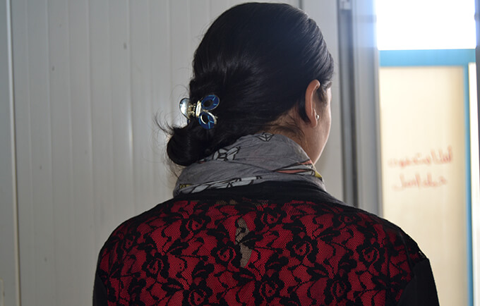 A Yazidi survivor of sexual violence by ISIS receives care at a UNFPA clinic. 