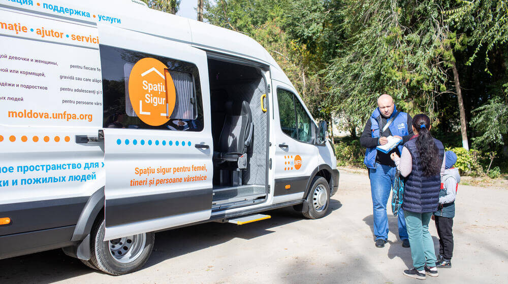 A team working at a mobile safe space in the Republic of Moldova takes response services to remote locations. © UNFPA Moldova