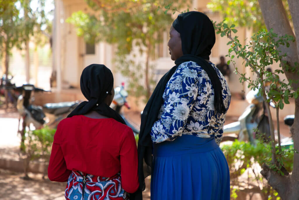 Image of a child survivor of rape, speaking with her guardian, who accompanied her to Sominé Dolo hospital. © UNFPA Mali/Amadou Maiga 