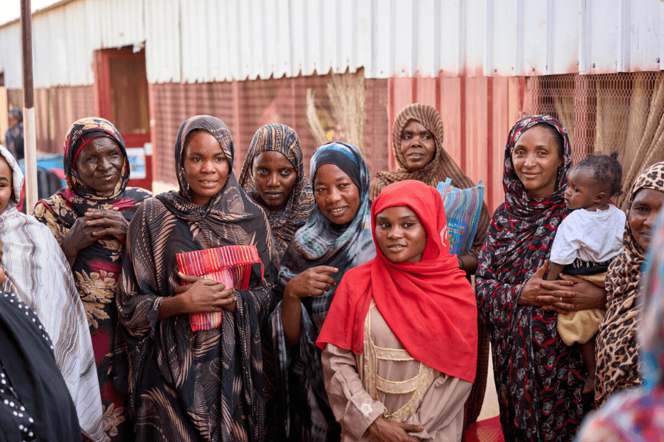 Women and girls gathered at a UNFPA safe space in Sudan.